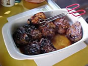 Image showing texture of well baked pieces of meat and potatoes