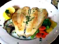 grilled fish with parsley butter and lemon