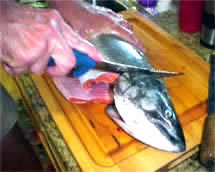 The shaping and removal of fins is called trimming