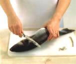 De-scaling, the removal of scales using a filleting or office knife