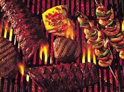 Image showing an assortment of skewed meats being grilled