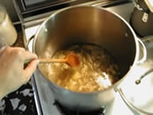 Image showing stock simmering in deep pan