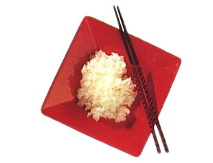 Image showing rice served on plate with chopsticks