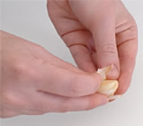 peeling garlic